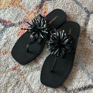 LARROUDE Hibiscus Sandal Thongs in Black - 9